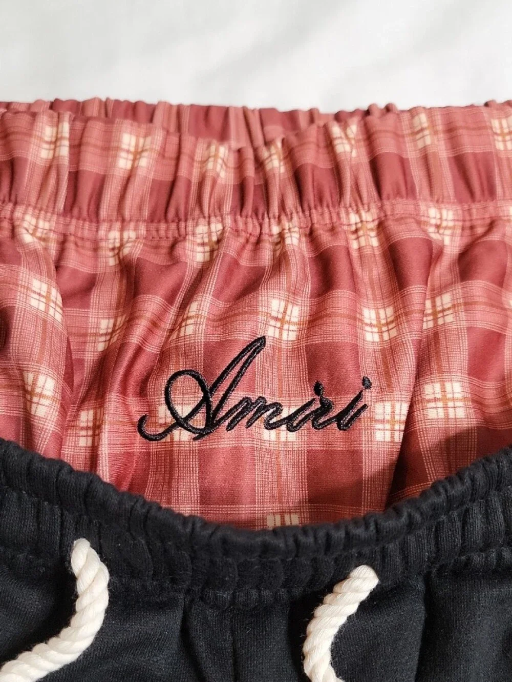 AMIRI Black Cargo Shorts with Red Plaid Double Layer